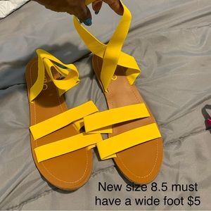 Flat sandals, must have a wide foot.